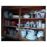 Assorted Kitchen Cabinet Contents with Dinnerware, Glassware, and Storage Containers