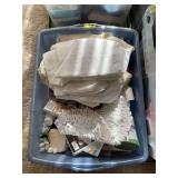 Storage Tote Containing Linens, Lace, and Craft Supplies