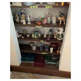 Assorted Display Shelf Contents Including Figurines, Glassware, and Board Games