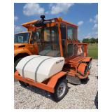 Sweeper with water tank