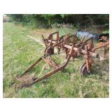 Tractor-Drawn Multi-Row Cultivator Implement with Metal Frame and Ground Wheels
