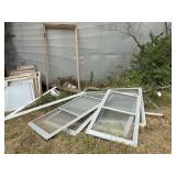 Assorted Lot of Building Materials Including Windows, Doors, Frames, and TV Antenna