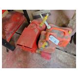 Lot of Red Fuel Cans and Storage Box