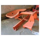 Orange Painted Cast Metal Tractor Seat with Spring Suspension Mount