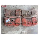 Set of Four Red Tractor Wheel Weights Part Number AM4162