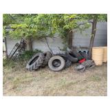 Assorted Tires, Metal Barrels, and Agricultural Equipment Lot