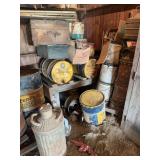 Assorted Petroleum Advertising Tins, Oil Drums, and Barn Finds