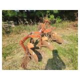 Orange Three-Bottom Tractor Plow with Steel Frame and Moldboards