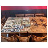 Assorted Texas License Plates and Decorative Metal Stars