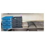 Three glass racks, five dish racks, one flatware, pre-soak tub, and three lid racks.