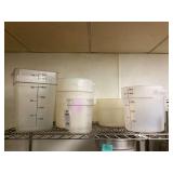 Assorted Commercial Food Storage Containers with Measurement Markings