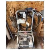 Craftsman Pressure Washer with Attached Decorative Windmill and Rooster Yard Art Accents