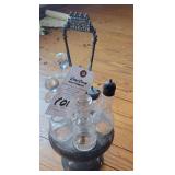 Metal Cast Stand with Five Glass Bottles and Shakers