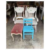 Assorted Seating Group Including White Spindle Armchairs, Blue Wooden Chair, and Upholstered Bench
