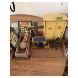 Mixed Collectibles Box Lot with Cast Iron Horse Drawn Carriage, Wooden Toy Cabinet, Comics, and Decor