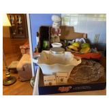 Kitchenware Assortment Including Glass Bowls, Ceramic Dishware, and Decorative Items