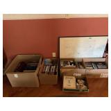 Large Assortment of Books, VHS Tapes, DVDs, and Framed McDonough County Topographic Map