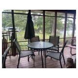 Round Glass Top Patio Table with Four Chairs and Umbrella