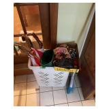 Assorted Walking Sticks and Umbrellas in Basket