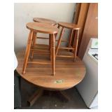Round Wooden Table with Four Matching Stools