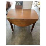 Wooden Drop-Leaf Dining Table with Turned Legs and Casters