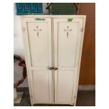White Double Door Storage Cabinet with Painted Motif and Contents