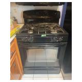 GE Black Freestanding Propane Range with Four Burners and Oven