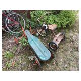 Lot of Two Ride-On Toys Including Tricycle and Lever-Propelled Car