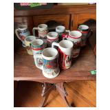 Collection of Budweiser Holiday and Anniversary Ceramic Beer Steins - Lot of 9