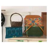 Lot of Blue Small Cabinet, Woven Basket, Green Woven Picnic Basket, and Embroidered Pillow