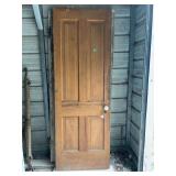 Five-Panel Wooden Interior Door with White Porcelain Doorknob and Hinges