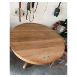 Round Wooden Pedestal Table with Casters
