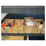 Four Boxes of Craft Supplies including Wood Cutouts, Lace, and Garland