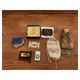 Assorted Collectibles and Accessories Grouping Including Brass Medallions, Lighters, and Evening Bags