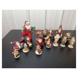 Collection of Assorted Santa Claus Figurines and Holiday Decor