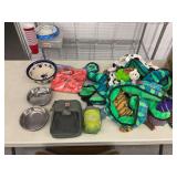 Dog Supplies Lot Including Bowls, Toys, Waste Bags, and First Aid Kit