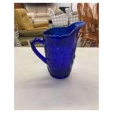 Cobalt Blue Pressed Glass Pitcher with Floral and Leaf Motif