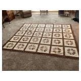 Handmade Quilt with Brown and White Flower Block Pattern
