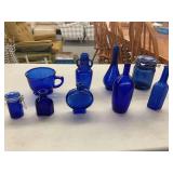 Cobalt Blue Glass Bottles, Jars, and Measuring Cup Collection