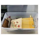 Plastic Storage Bin with Picture Frames and Decorative Art