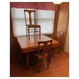 Oak Dining Table and Four Chairs Set with Turned Legs and Casters