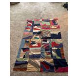 Handmade Crazy Quilt with Multicolored Fabric Scraps and Embroidered Stitching