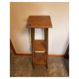 Wooden Tiered Plant Stand and Round Lace Tablecloth