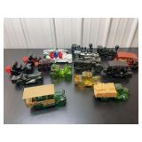 Collection of Glass Figural Bottles and Decanters in Various Vehicle and Train Designs