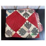 Patchwork Quilt in Red and Patterned Fabrics