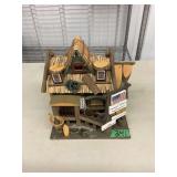 Rustic Wooden Birdhouse Designed as Wagon Wheel Restaurant