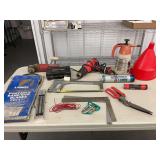 Assorted Tools and Hardware Lot including Saw, Grinder, Heat Gun, and Lubricants