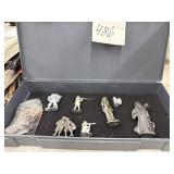 Cast metal miniature figurines