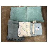 Sheets, pillows, throw