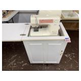 Sewing machine and cabinet